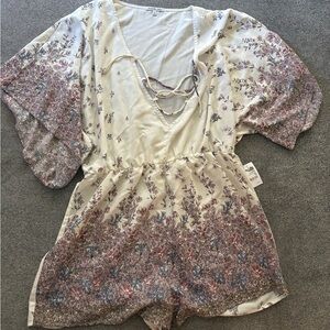 New Charlotte Russe Cream and Purple Floral romper